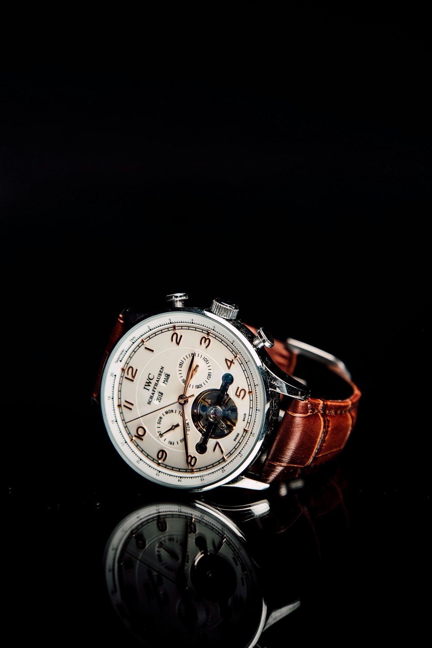 Gold rings, watches, and straps finished at the atelier bench
